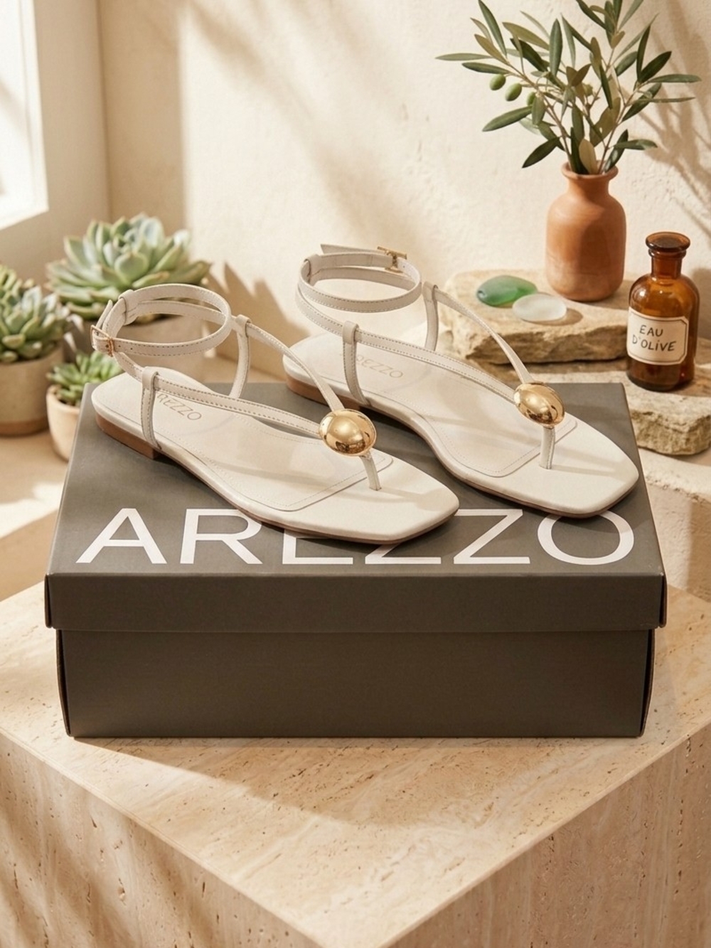Arezzo White T-Strap Sandals with Gold Accent